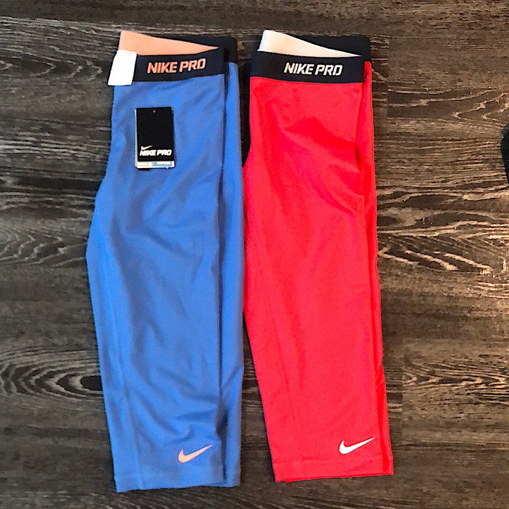 2 pairs cropped Nike Pro workout leggings